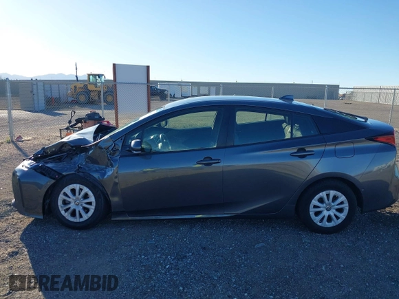 2020 Toyota Prius L Eco z VIN JTDKARFU2L3120891, wystawiony jako IAAI lot #41318597 z przebiegiem 79 848 mil mil oraz . Historia ofert i sprzedaży dostępna na DreamBid. Obrazek 14.