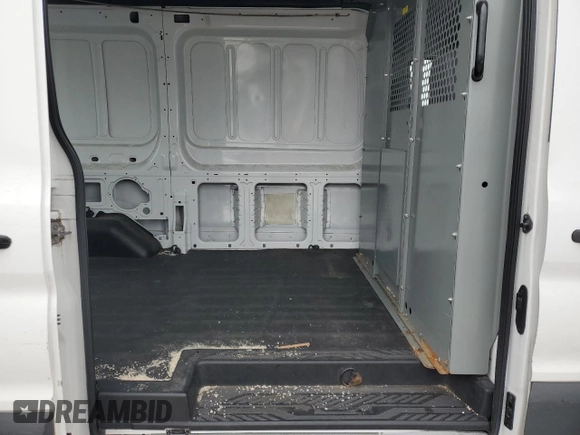 2015 Ford Transit Cargo с VIN 1FTNR1CM2FKA52758, выставлен на аукционе Copart как лот 57888505 с пробегом 65 529 миль миль и Списание • Salvage title. История ставок и продаж доступна на DreamBid. Изображение 10.