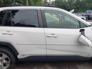 2019 Toyota RAV4 Hybrid LE with VIN JTMMWRFV9KD021285, listed as a IAAI auction lot 42757660 with 74,870 mi miles and . Bid and sale history available at DreamBid. Image 13.