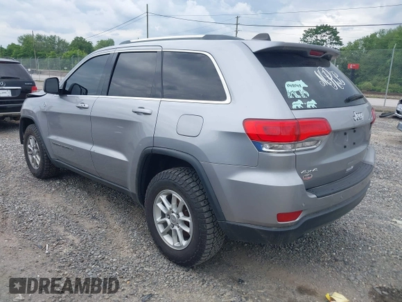2018 Jeep Grand Cherokee Laredo E with VIN 1C4RJFAG4JC475993, listed as a IAAI auction lot 42295008 with 106,024 mi miles and . Bid and sale history available at DreamBid. Image 3.