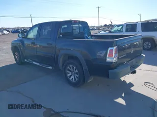 2006 Mitsubishi Raider Duro Cross with VIN 1Z7HT38N66S580223, listed as a IAAI auction lot 41285120 with 83,421 mi miles. Bid and sale history available at carsss.com. Image 3.