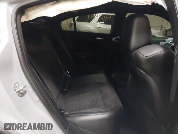2021 Dodge Charger Scat Pack Widebody with VIN 2C3CDXGJ4MH540627, listed as a IAAI auction lot 41171991 with 31,394 mi miles and . Bid and sale history available at DreamBid. Image 8.