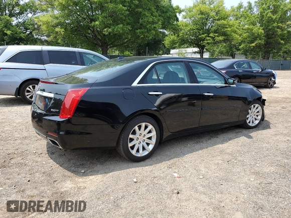 2014 Cadillac CTS Luxury AWD with VIN 1G6AX5SXXE0120681, listed as a Copart auction lot 60076655 with 99,552 mi miles and Salvage title. Bid and sale history available at DreamBid. Image 3.