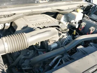 2020 Ram 1500 Lone Star z VIN 1C6RREFT0LN194409, wystawiony jako IAAI lot #41517361 z przebiegiem 107 751 mil mil oraz . Historia ofert i sprzedaży dostępna na DreamBid. Obrazek 21.