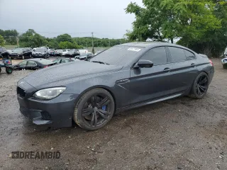 2015 BMW M6 z VIN WBS6C9C59FD467943, wystawiony jako Copart lot #63477904 z przebiegiem 80 186 mil mil oraz Szkody całkowita. Historia ofert i sprzedaży dostępna na DreamBid. Obrazek 1.