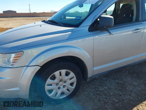 2014 Dodge Journey American Value Pkg with VIN 3C4PDCAB5ET119192, listed as a IAAI auction lot 41344250 with 228,461 mi miles. Bid and sale history available at carsss.com. Image 6.