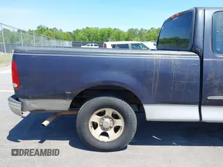 1999 Ford F-150 with VIN 1FTRX17W9XNB32397, listed as a IAAI auction lot 42048746 with 290,179 mi miles and . Bid and sale history available at DreamBid. Image 13.