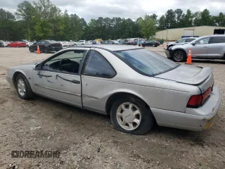 1995 Ford Thunderbird LX z VIN 1FALP62W7SH169522, wystawiony jako Copart lot #58637765 z przebiegiem 136 505 mil mil oraz Czysty tytuł • Clean title. Historia ofert i sprzedaży dostępna na DreamBid. Obrazek 2.