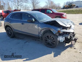 2021 Mazda CX-30 Premium with VIN 3MVDMBDY6MM300242, listed as a Copart auction lot 82195024 with 34,500 mi miles and Salvage Title. Bid and sale history available at carsss.com. Image 4.