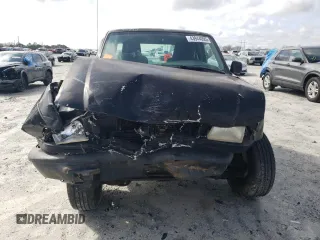 2000 Mazda B-Series 2WD Truck SX with VIN 4F4YR12V6YTM25960, listed as a Copart auction lot 43944095 with 140,980 mi miles and Salvage Title. Bid and sale history available at carsss.com. Image 5.