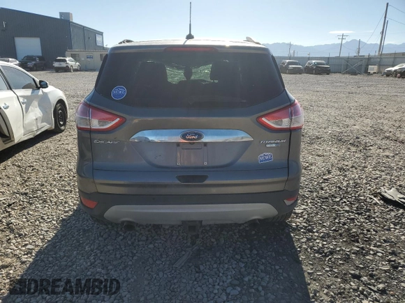 2014 Ford Escape Titanium with VIN 1FMCU9J90EUD94405, listed as a Copart auction lot 68489754 with 52,045 mi miles and Salvage Title. Bid and sale history available at DreamBid. Image 6.