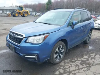 2018 Subaru Forester Limited with VIN JF2SJAJC4JH525104, listed as a IAAI auction lot 42018479 with 97,843 mi miles. Bid and sale history available at carsss.com. Image 2.