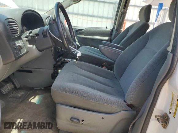 2005 Dodge Caravan SXT z VIN 2D4GP44L15R380469, wystawiony jako Copart lot #58800775 z przebiegiem Nie podano mil oraz Szkoda całkowita • Salvage title. Historia ofert i sprzedaży dostępna na DreamBid. Obrazek 7.