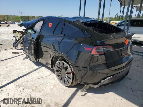 2022 Tesla Model Y Performance z VIN 7SAYGDEF2NF448013, wystawiony jako Copart lot #52323435 z przebiegiem Nie podano mil oraz Nie do naprawy • Non repairable. Historia ofert i sprzedaży dostępna na DreamBid. Obrazek 2.