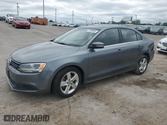 2014 Volkswagen Jetta TDI w/Premium/Nav z VIN 3VWLL7AJ1EM430822, wystawiony jako Copart lot #57405845 z przebiegiem 112 178 mil mil oraz Szkoda całkowita • Salvage title. Historia ofert i sprzedaży dostępna na DreamBid. Obrazek 1.