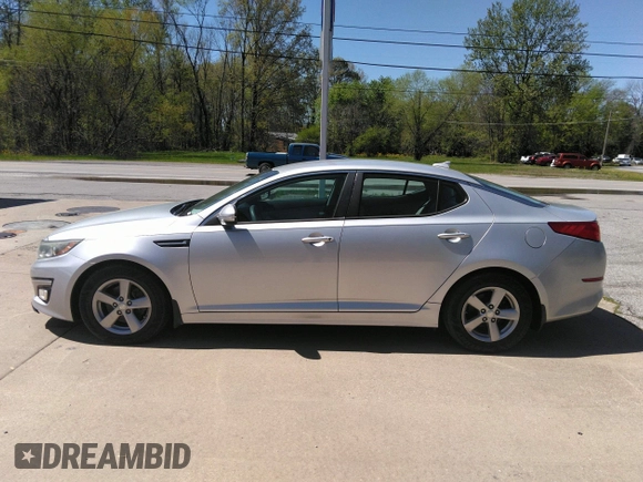 2014 Kia Optima LX with VIN 5XXGM4A70EG340051, listed as a IAAI auction lot 42048762 with 146,519 mi miles. Bid and sale history available at carsss.com. Image 12.
