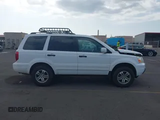 2005 Honda Pilot EX-L with RES with VIN 2HKYF186X5H530910, listed as a IAAI auction lot 41167862 with 199,775 mi miles. Bid and sale history available at carsss.com. Image 13.