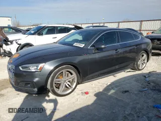 2018 Audi A5 Sportback Prestige with VIN WAUFNCF50JA128442, listed as a Copart auction lot 86828644 with 101,650 mi miles and Salvage Title. Bid and sale history available at carsss.com. Image 1.