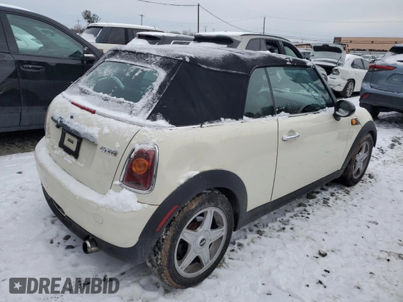 2010 MINI Convertible with VIN WMWMR3C50ATU97287, listed as a Copart auction lot 89116615 with 120,323 mi miles and Salvage Title. Bid and sale history available at DreamBid. Image 3.
