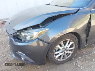 2014 Mazda 3 i Grand Touring with VIN JM1BM1M77E1119529, listed as a IAAI auction lot 41399739 with 126,931 mi miles and . Bid and sale history available at DreamBid. Image 6.