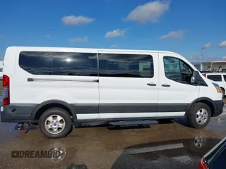 2020 Ford Transit Passenger XL with VIN 1FBAX2Y81LKA26321, listed as a IAAI auction lot 41110834 with Not Provided miles and . Bid and sale history available at DreamBid. Image 13.