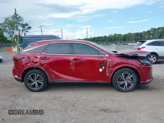 2024 Lexus RX 350h with VIN 2T2BBMCA8RC036659, listed as a IAAI auction lot 42619124 with 19,821 mi miles and . Bid and sale history available at DreamBid. Image 13.