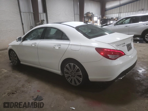 2018 Mercedes-Benz CLA 250 with VIN WDDSJ4GB2JN631802, listed as a Copart auction lot 66105123 with 28,093 mi miles and . Bid and sale history available at DreamBid. Image 2.