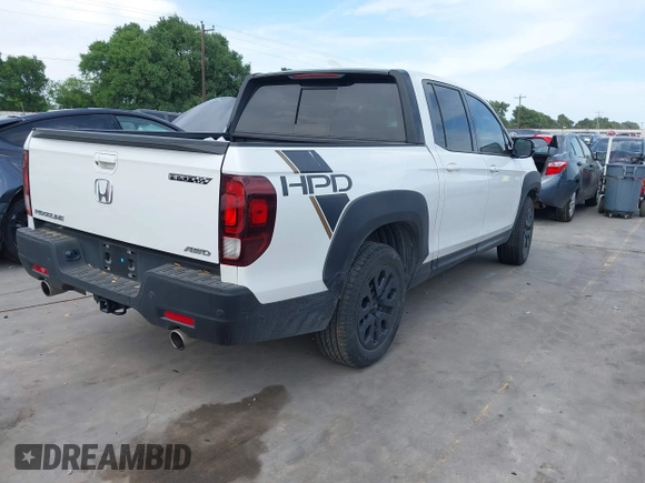 2023 Honda Ridgeline Black Edition with VIN 5FPYK3F84PB011792, listed as a IAAI auction lot 42049593 with 21,002 mi miles and . Bid and sale history available at DreamBid. Image 4.