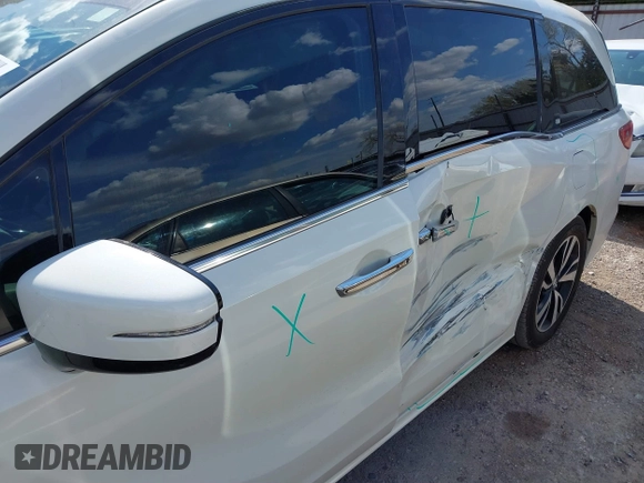 2019 Honda Odyssey Elite with VIN 5FNRL6H91KB053203, listed as a IAAI auction lot 41866308 with 84,700 mi miles and . Bid and sale history available at DreamBid. Image 6.