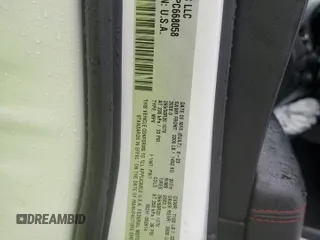 2023 Dodge Durango R/T Plus z VIN 1C4SDHCT1PC668058, wystawiony jako Copart lot #45879195 z przebiegiem 41 654 mil mil oraz Szkoda całkowita • Salvage title. Historia ofert i sprzedaży dostępna na DreamBid. Obrazek 13.
