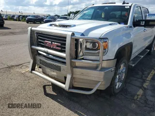 2018 GMC Sierra 2500HD SLT with VIN 1GT12TEY1JF169151, listed as a IAAI auction lot 42683311 with 245,119 mi miles and . Bid and sale history available at DreamBid. Image 1.