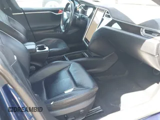 2016 Tesla Model S 90D with VIN 5YJSA1E25GF157220, listed as a IAAI auction lot 42003019 with 130,540 mi miles and . Bid and sale history available at DreamBid. Image 5.