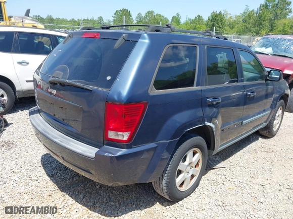2009 Jeep Grand Cherokee Laredo with VIN 1J8GS48K79C539659, listed as a IAAI auction lot 42063431 with 1 mi miles. Bid and sale history available at carsss.com. Image 4.