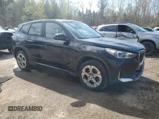 2023 BMW X1 xDrive28i z VIN WBX73EF04P5W99465, wystawiony jako Copart lot #55800655 z przebiegiem 53 799 mil mil oraz Tytuł czysty. Historia ofert i sprzedaży dostępna na DreamBid. Obrazek 4.