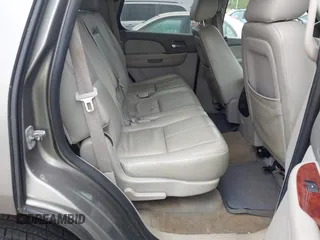 2009 Chevrolet Tahoe 2LT z VIN 1GNFK23069R250256, wystawiony jako IAAI lot #42448620 z przebiegiem 207 255 mil mil oraz . Historia ofert i sprzedaży dostępna na DreamBid. Obrazek 8.