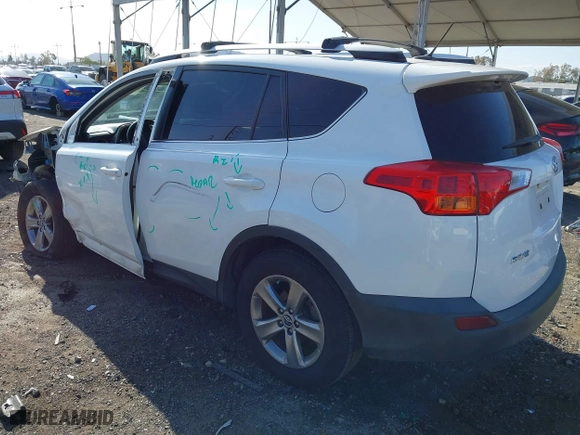2015 Toyota RAV4 XLE with VIN JTMWFREV9FJ034992, listed as a IAAI auction lot 41922694 with 100,956 mi miles. Bid and sale history available at carsss.com. Image 3.