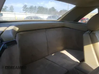 1990 Mercedes-Benz 500 z VIN WDBFA66E8LF010613, wystawiony jako Copart lot #47093275 z przebiegiem 120 814 mil mil oraz Szkody całkowita. Historia ofert i sprzedaży dostępna na DreamBid. Obrazek 10.