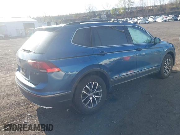2020 Volkswagen Tiguan SE with VIN 3VV2B7AX2LM017277, listed as a IAAI auction lot 42075052 with 72,248 mi miles and . Bid and sale history available at DreamBid. Image 4.
