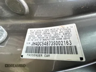 2003 Acura RSX z VIN JH4DC54873S002163, wystawiony jako Copart lot #51872605 z przebiegiem Nie podano mil oraz Szkoda całkowita • Salvage title. Historia ofert i sprzedaży dostępna na DreamBid. Obrazek 10.