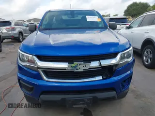 2018 Chevrolet Colorado 2WD Work Truck z VIN 1GCHSBEA8J1300911, wystawiony jako IAAI lot #42543557 z przebiegiem 73 896 mil mil oraz . Historia ofert i sprzedaży dostępna na DreamBid. Obrazek 6.