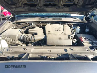2023 Toyota Tacoma SR with VIN 3TMCZ5AN2PM553928, listed as a IAAI auction lot 40999044 with 9,210 mi miles and . Bid and sale history available at DreamBid. Image 10.
