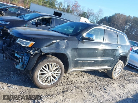 2018 Jeep Grand Cherokee Summit with VIN 1C4RJFJG1JC211047, listed as a IAAI auction lot 41133865 with 66,588 mi miles and . Bid and sale history available at DreamBid. Image 14.