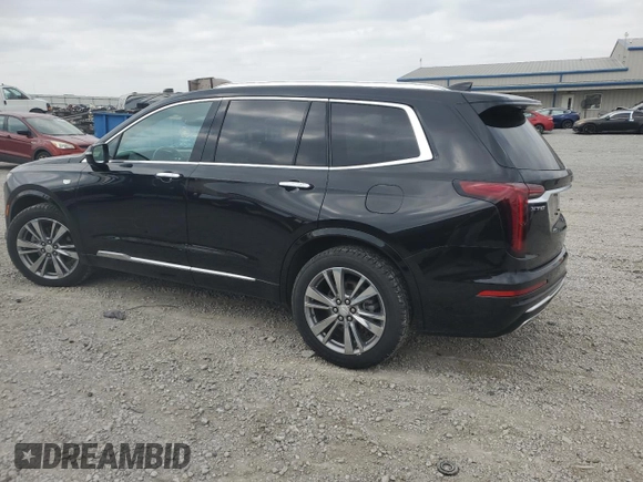 2020 Cadillac XT6 FWD Premium Luxury with VIN 1GYKPCRS2LZ138174, listed as a Copart auction lot 52495655 with 30,822 mi miles and Salvage Title. Bid and sale history available at carsss.com. Image 2.