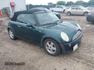2005 MINI Convertible with VIN WMWRF33495TG11818, listed as a IAAI auction lot 42351446 with 100,033 mi miles and . Bid and sale history available at DreamBid. Image 1.