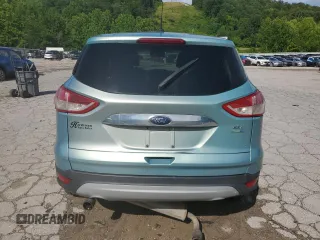 2013 Ford Escape SEL z VIN 1FMCU9H98DUC56048, wystawiony jako Copart lot #61613085 z przebiegiem 198 102 mil mil oraz Szkoda całkowita • Salvage title. Historia ofert i sprzedaży dostępna na DreamBid. Obrazek 6.