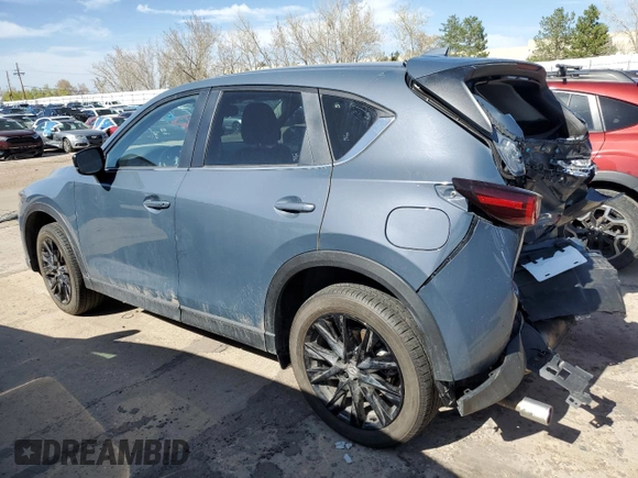 2024 Mazda CX-5 2.5 S Carbon Edition with VIN JM3KFBCMXR0396072, listed as a Copart auction lot 51162695 with 27,457 mi miles and Salvage Title. Bid and sale history available at carsss.com. Image 2.