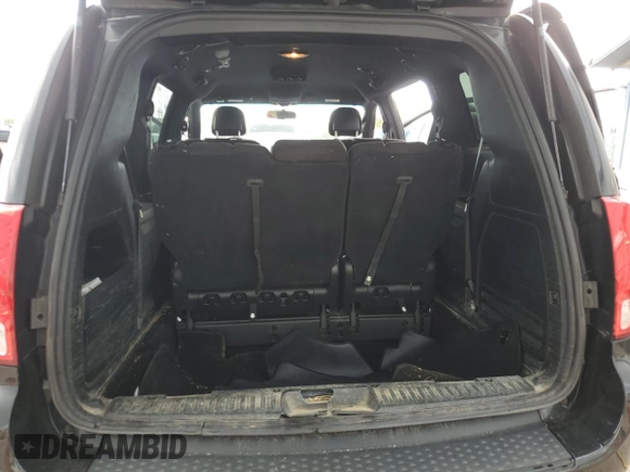 2015 Dodge Grand Caravan American Value with VIN 2C4RDGBG6FR659777, listed as a Copart auction lot 53847385 with 176,802 mi miles and Salvage Title. Bid and sale history available at DreamBid. Image 6.
