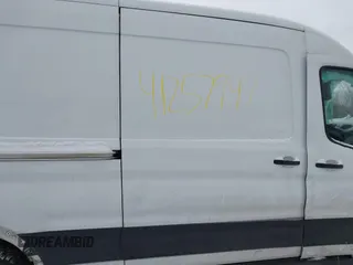2021 Ford Transit Cargo with VIN 1FTBR1C87MKA51317, listed as a IAAI auction lot 41257947 with 62,000 mi miles and . Bid and sale history available at DreamBid. Image 8.