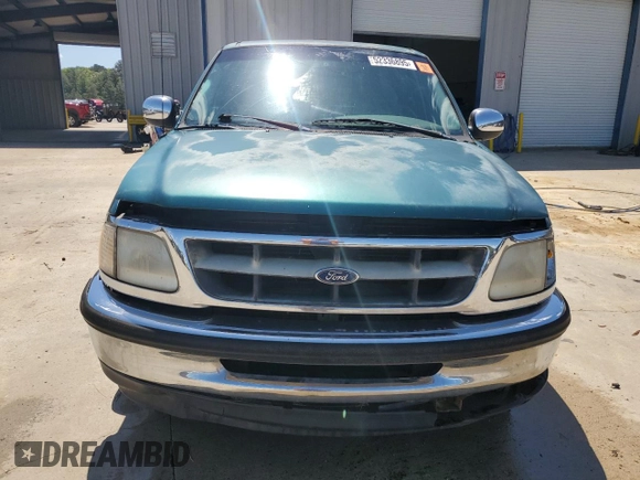 1998 Ford F-150 z VIN 1FTZX1768WNB23317, wystawiony jako Copart lot #52336895 z przebiegiem 288 431 mil mil oraz Szkoda całkowita • Salvage title. Historia ofert i sprzedaży dostępna na DreamBid. Obrazek 5.