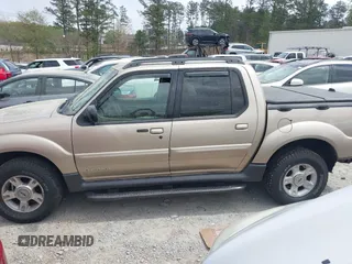 2002 Ford Explorer Sport Trac Value z VIN 1FMZU67E32UB39918, wystawiony jako IAAI lot #41937332 z przebiegiem 201 713 mil mil oraz . Historia ofert i sprzedaży dostępna na DreamBid. Obrazek 14.